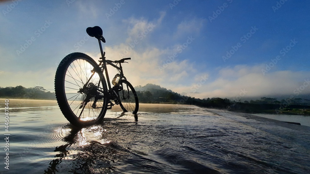 Fototapeta premium bicycle on the river