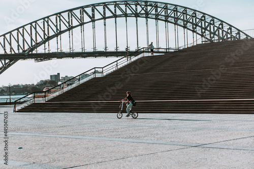 "Sydney, NSW / Australia - April 17, 2020: Sydney Opera House and Circular Quay surroundings completely isolated and with social distancing under lockdown due to Coronavirus outbreak" © Juan