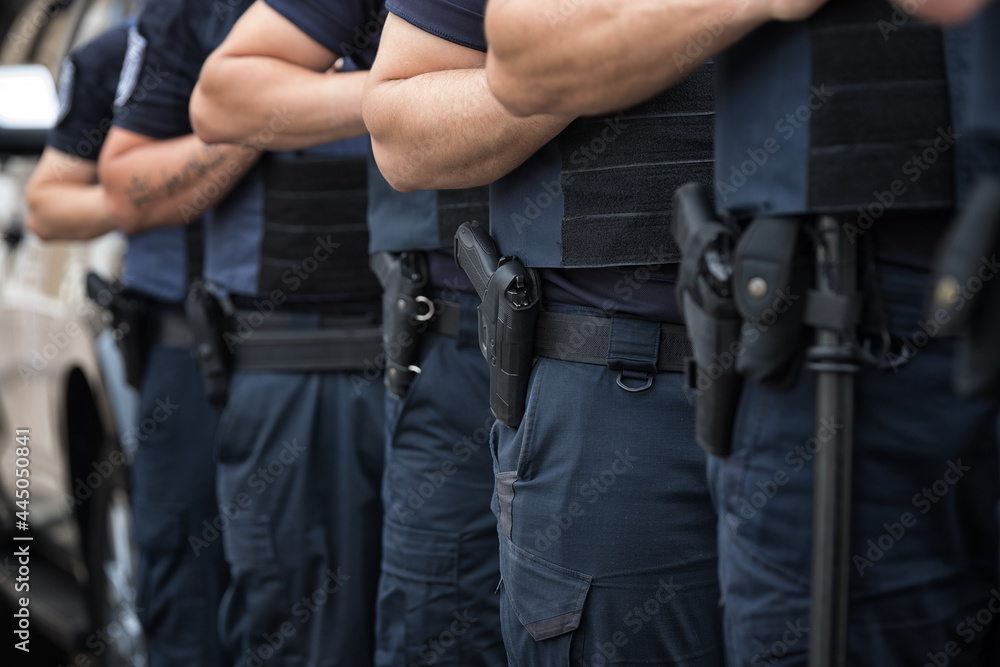 Soldiers security in the ranks, ammunition equipment and weapons, with a shallow depth of field Soldiers security in the ranks, ammunition equipment and weapons, with a shallow depth of field