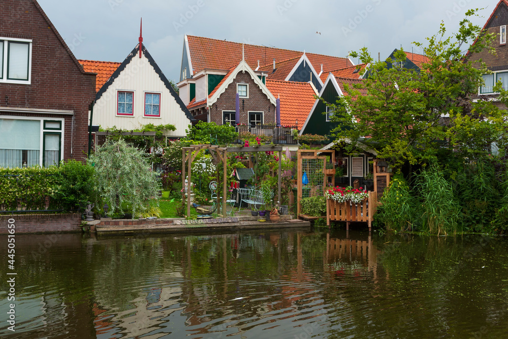 The small town of Volendam, on Markermeer Lake, northeast of Amsterdam, which is known for its colorful wooden houses and the old fishing boats. The small town of Volendam, on Markermeer Lake, northeast of Amsterdam, which is known for its colorful wooden houses and the old fishing boats.