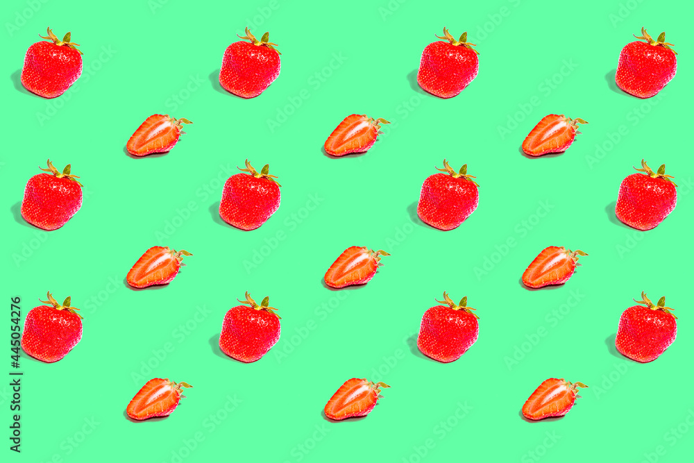 A pattern of strawberries on a colored background A pattern of strawberries on a colored background