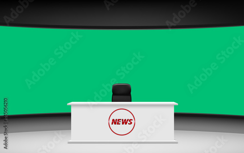 white table with the green background in the news studio