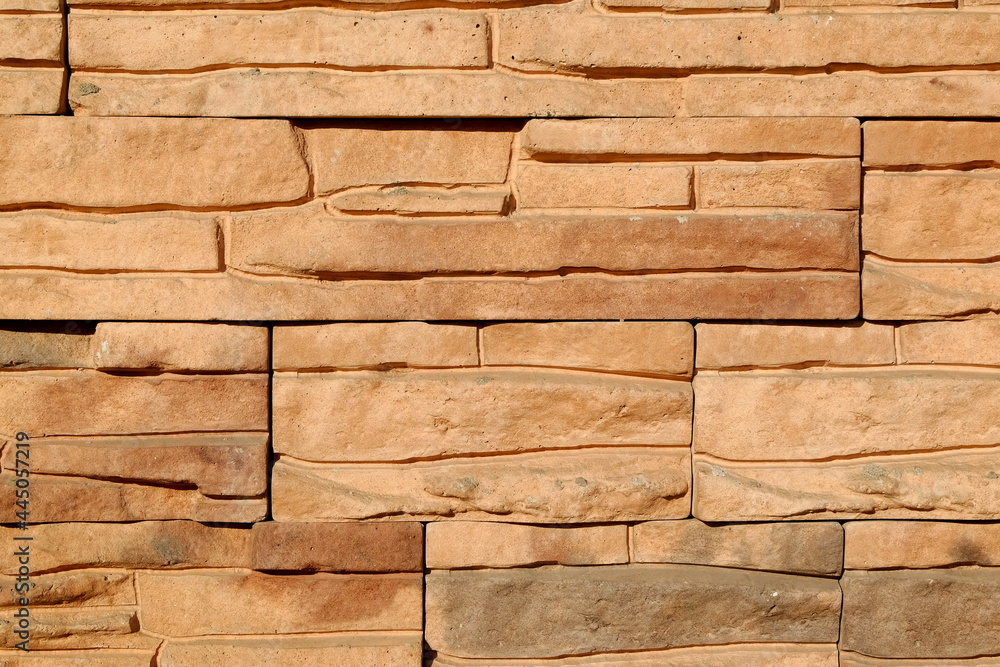 Obraz premium orange clay block wall texture