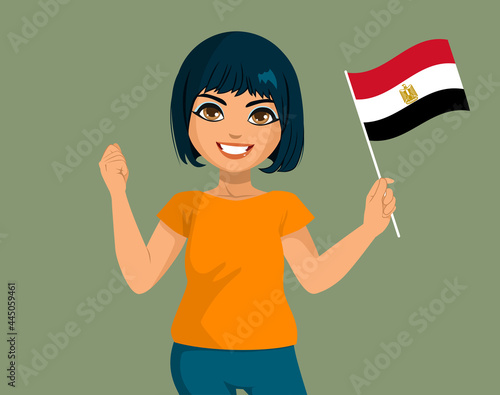 Beautiful young happy smiling egyptian woman holding Egypt flag