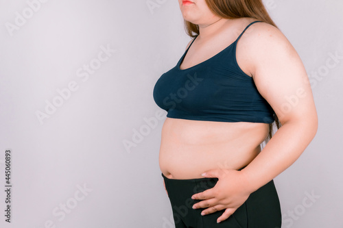 Fat woman measuring isolated over