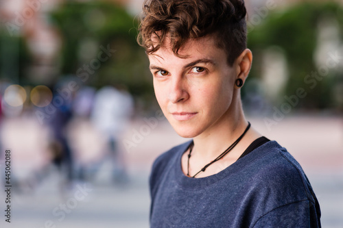 Non binary hispanic transgender mid Tomboy. Androgynous authentic identity for gender and sex education photo