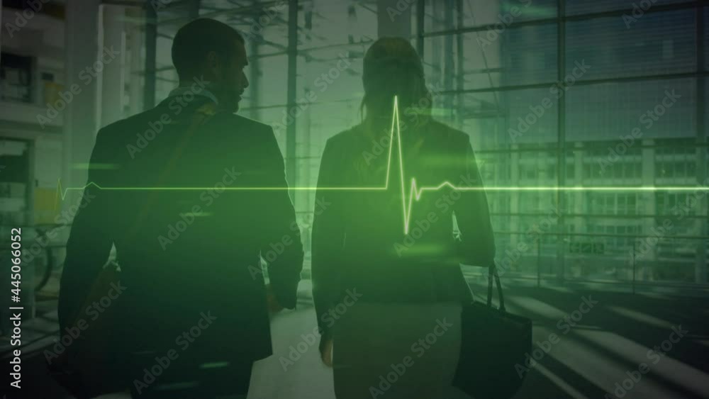Animation of glowing green heart rate monitor and data, over couple walking in modern building Animation of glowing green heart rate monitor and data, over couple walking in modern building