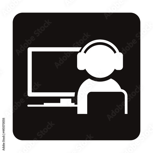 ヘッドフォンをしてデスクトップパソコンを使用する人物のアイコン/白ヌキ