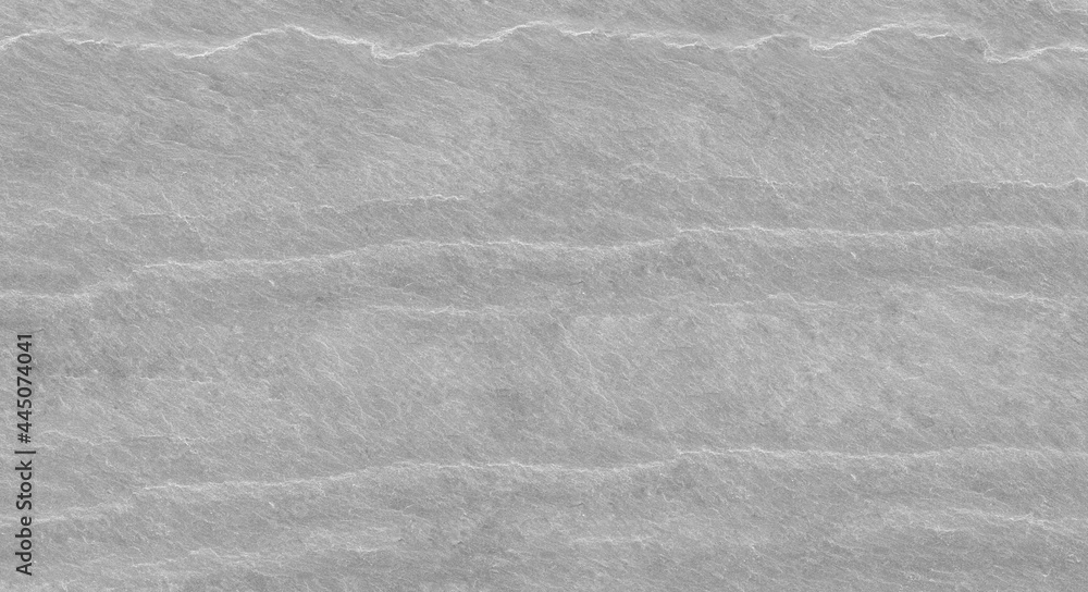 Abstract stone background. The texture of the stone wall. Close-up. Light gray rock backdrop Abstract stone background. The texture of the stone wall. Close-up. Light gray rock backdrop