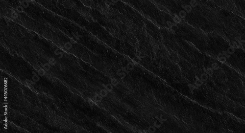 Black rock background. Dark gray stone texture. Black grunge background. Black rock background. Dark gray stone texture. Black grunge background.