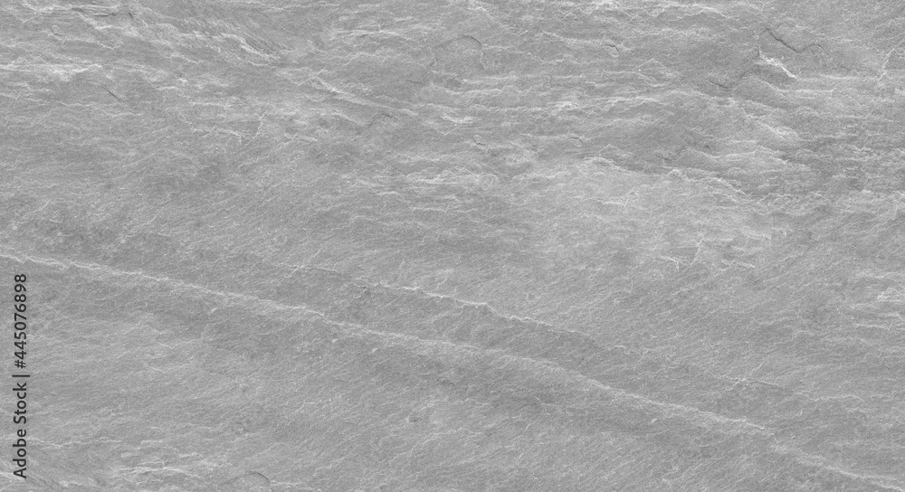 Abstract stone background. The texture of the stone wall. Close-up. Light gray rock backdrop Abstract stone background. The texture of the stone wall. Close-up. Light gray rock backdrop