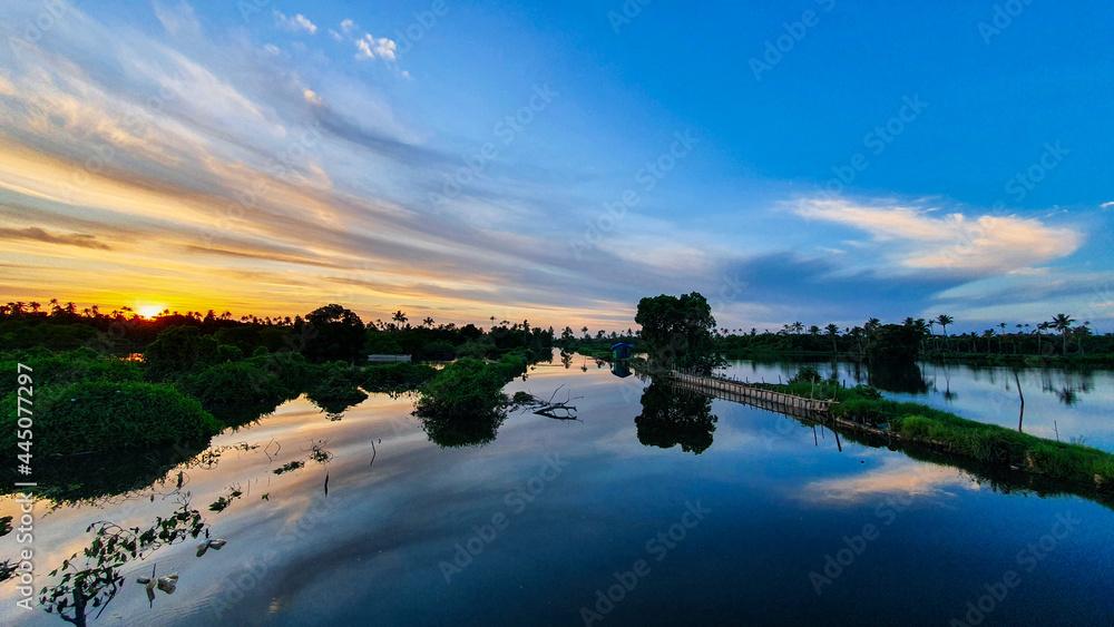 Fototapeta premium A beautiful sunset at the fish farm