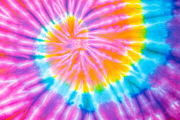 abstract rainbow spiral tie dye background.