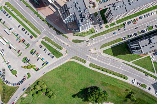 road intersection in new residential district. urban aerial view in sunny summer day.