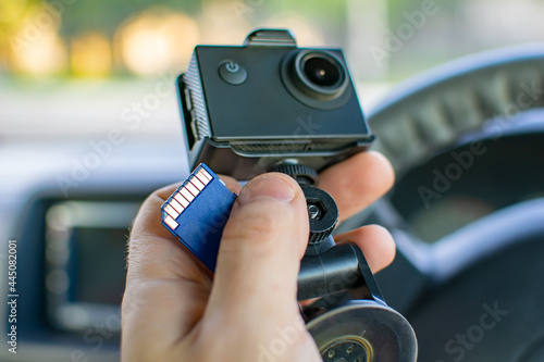 Canvas Print a faulty electronic memory card in a person's hand against the background of the