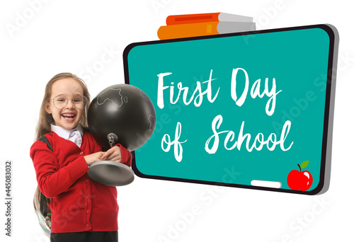 Cute little schoolgirl with...
