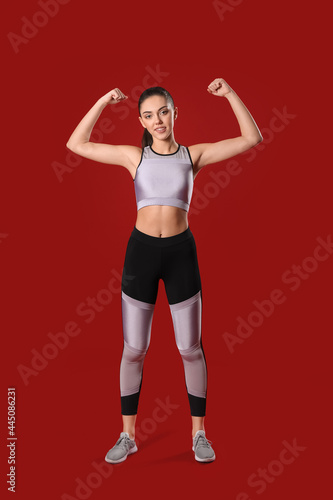 Sporty female coach on colo...