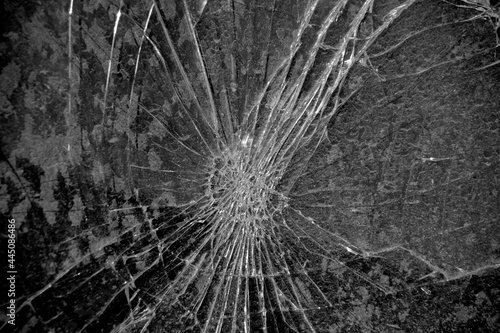 The broken windshield of the car .Destruction due to an accident or road accident.