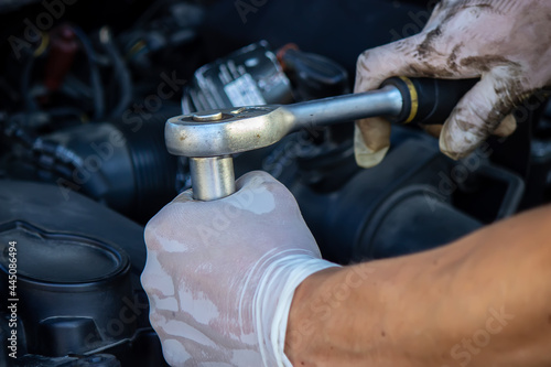 replacing the oil filter on the car.