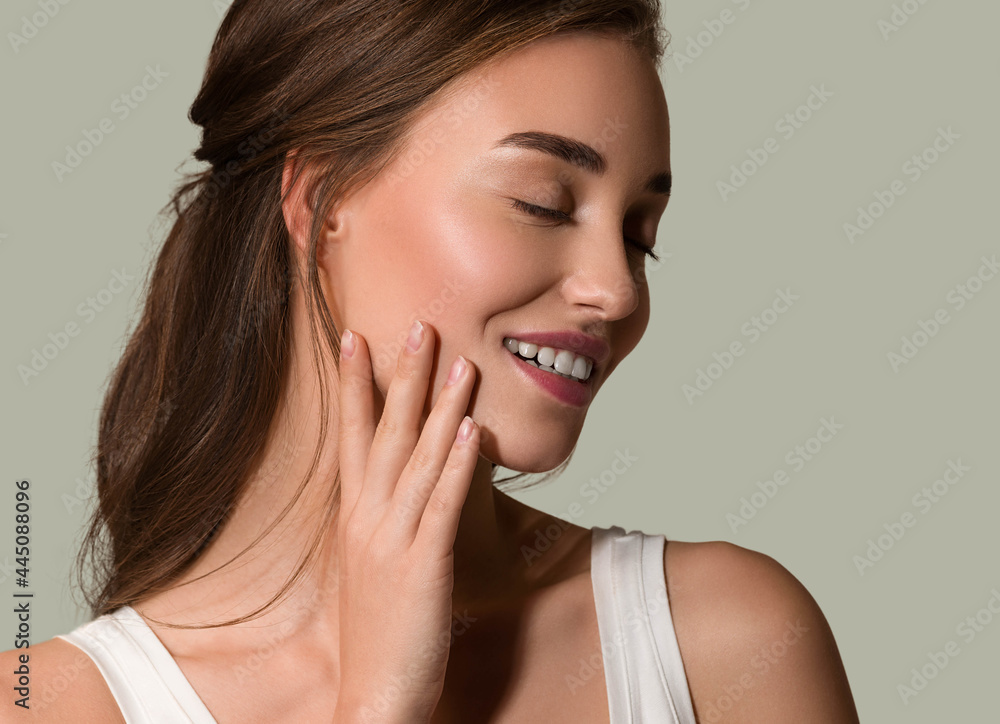 Beauty woman face natural make up healthy skin over color background Beauty woman face natural make up healthy skin over color background