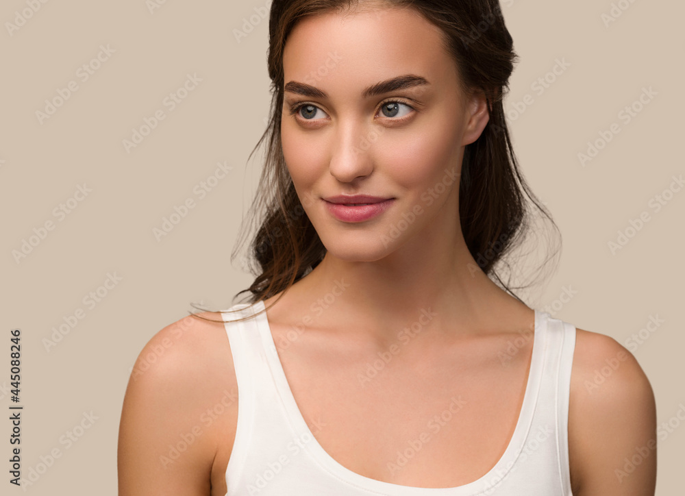 Beauty woman face natural make up healthy skin over color background Beauty woman face natural make up healthy skin over color background