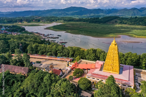 Chedi Phutthakhaya or Puttakaya Pagoda, Wat wang Wiwekaram or wat luang pho uttama in Sangkhlaburi, Kanchanaburi, Thailand photo