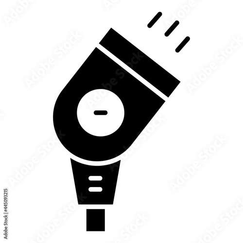 A solid design icon of floodlight