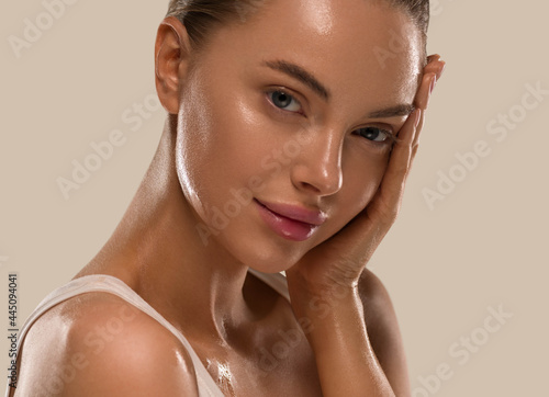 Beautiful woman face healthy skin natural make up close up photo
