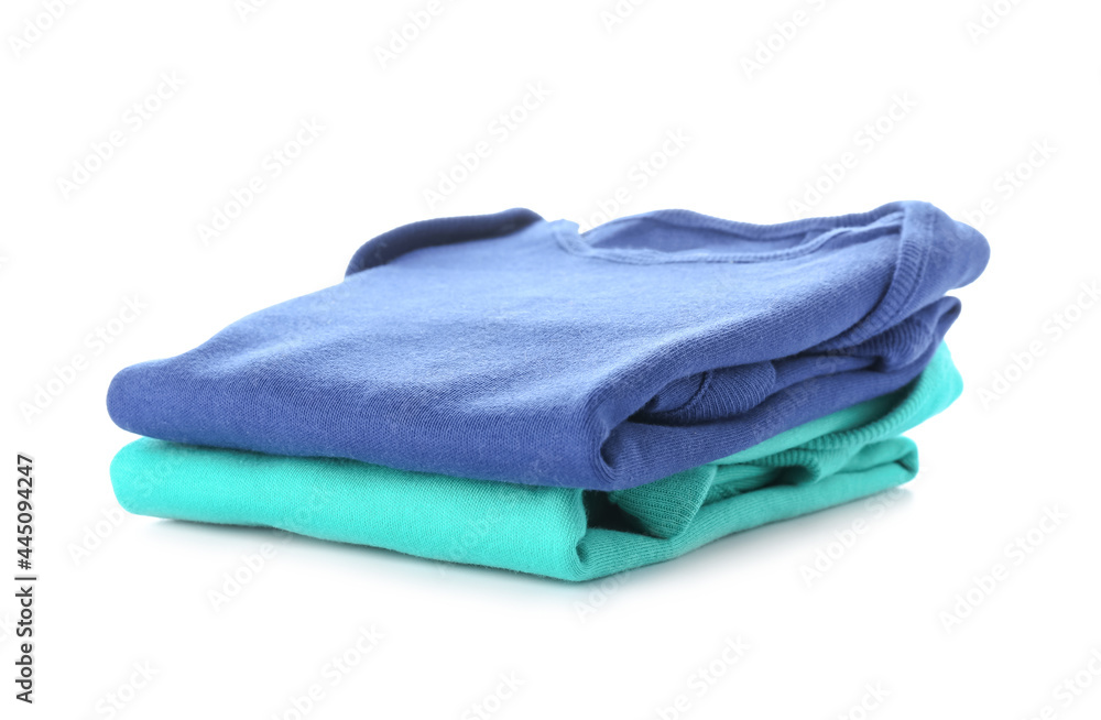 Stack of baby clothes on white background Stack of baby clothes on white background