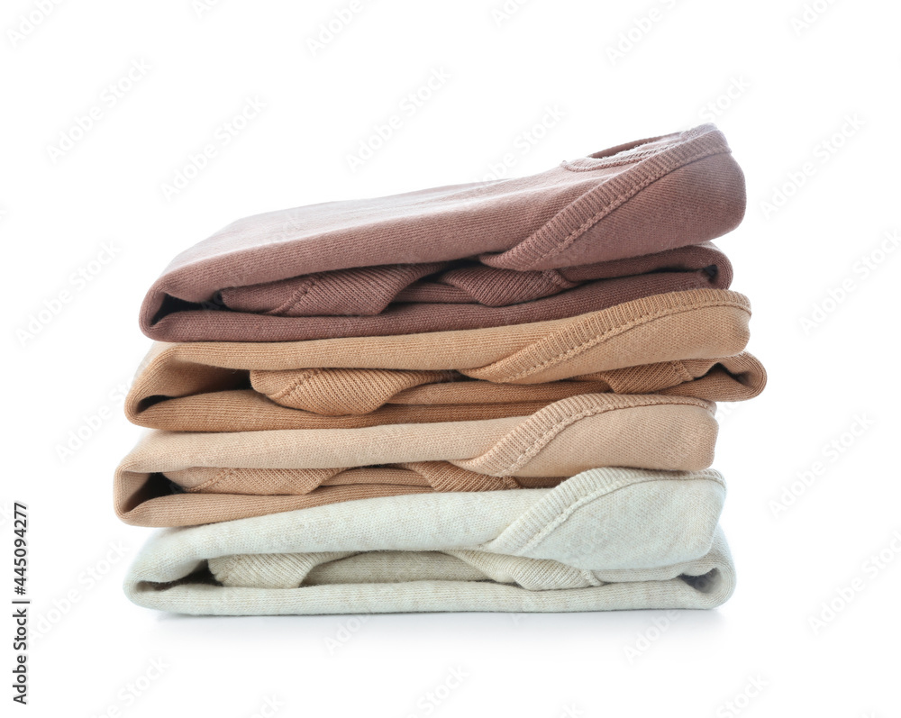 Stack of baby clothes on white background Stack of baby clothes on white background