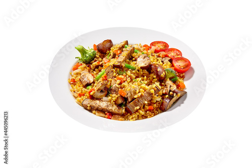 Vegetarian barley pilaf with eggplants, mushrooms, broccoli, tomatoes