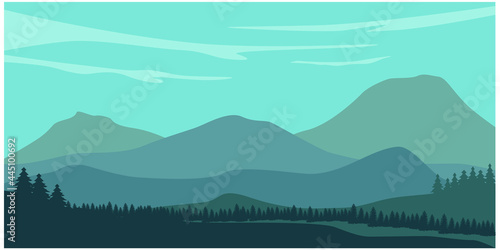 Mountain landscape with silhouettes of forest trees mountains and hills. Panoramic mountain view.