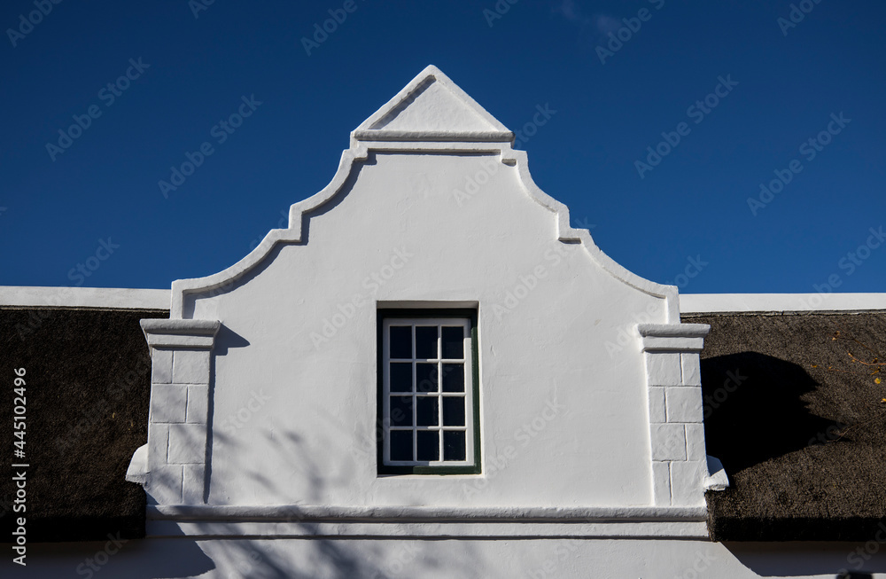 The front view of part of an old house
The front view of part of an old house showing the classic gable
