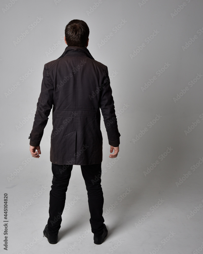 Premium Photo | Handsome boy wearing long coat with stylish pose
