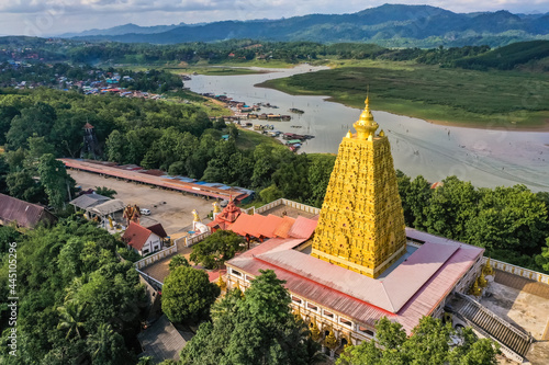 Chedi Phutthakhaya or Puttakaya Pagoda, Wat wang Wiwekaram or wat luang pho uttama in Sangkhlaburi, Kanchanaburi, Thailand photo