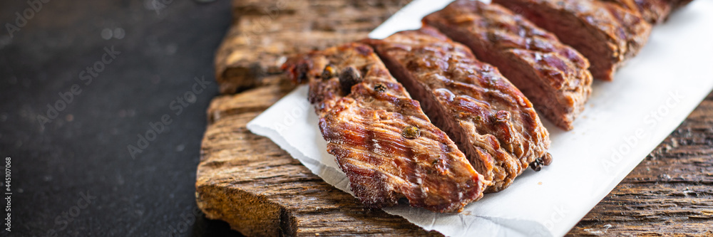 beef steak juicy meat grilled barbecue B-B-Q on the table, healthy meal snack copy space food background rustic top view 