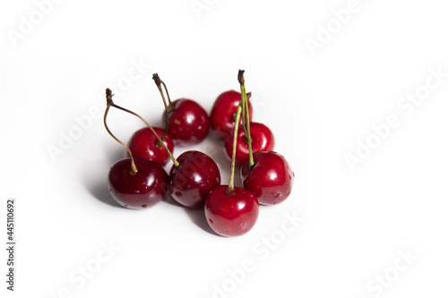 Red ripe sweet cherry on an isolated background. 