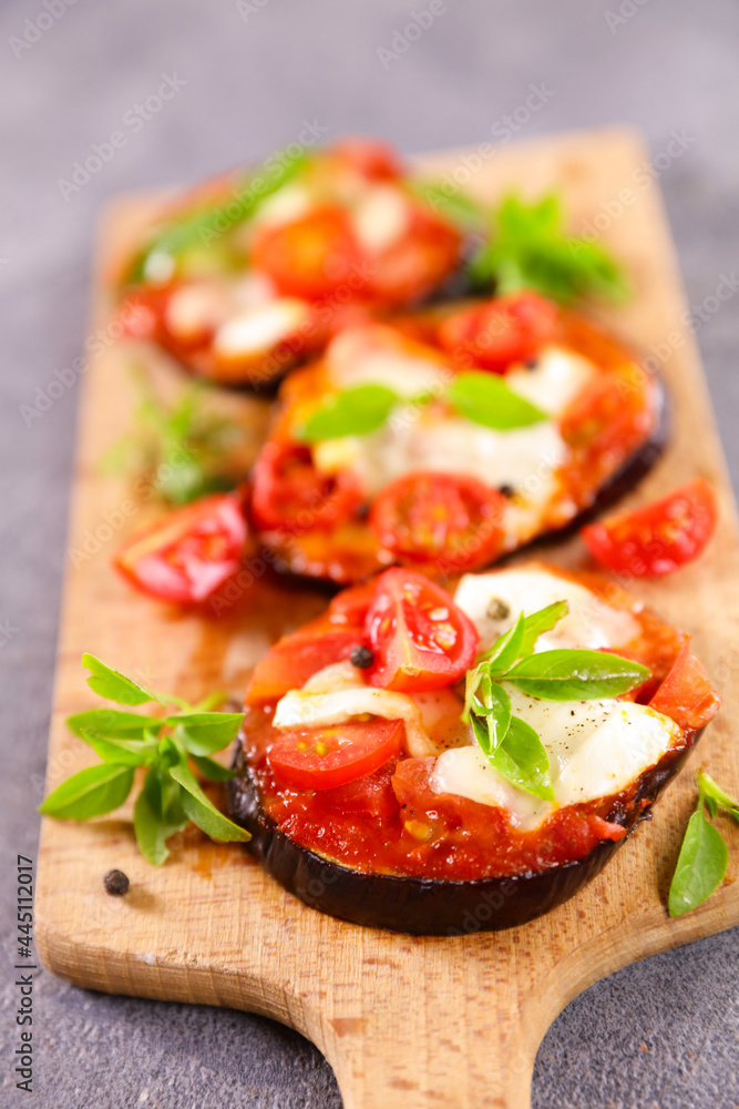 eggplant pizza with tomato sauce,  mozzarella and basil