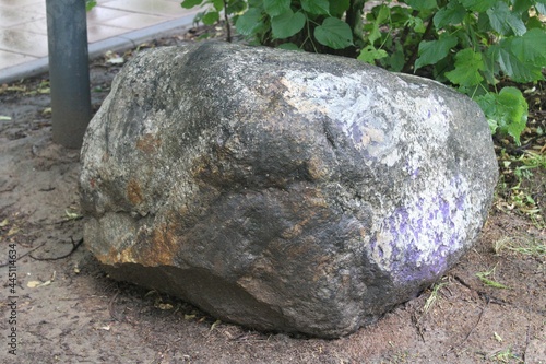 Large stone and soil