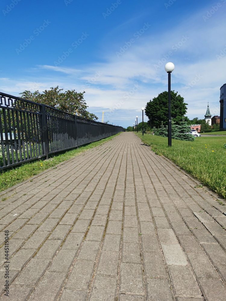 A paved path along the bastion on the observation deck of the exhibition center in the city of Vyborg.
