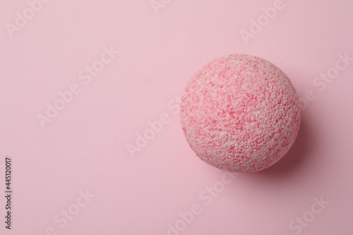 Bath ball on pink background  space for text