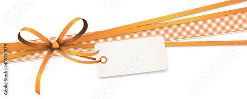 orange colored ribbon bow with hang tag