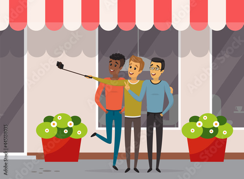 Group of male friends taking selfie photo with smartphone. Young people having fun and making selfie. Friendship and technology concept. Men with phone on monopod are posing for joint photo