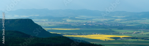 High resolution panorama from Szczeliniec Wielki viewpoint at sunset, they call it Table Mountains, sun-drenched green fields in poland. 