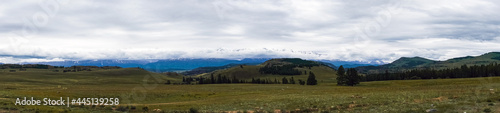 snow caps of mountain peaks in the distance