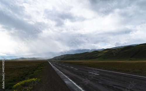 road, mountains, clouds and sky