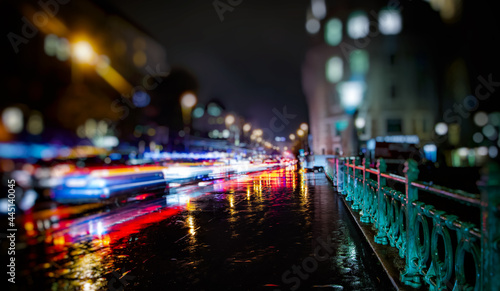 colorful traffic in the city on rainy night © babaroga