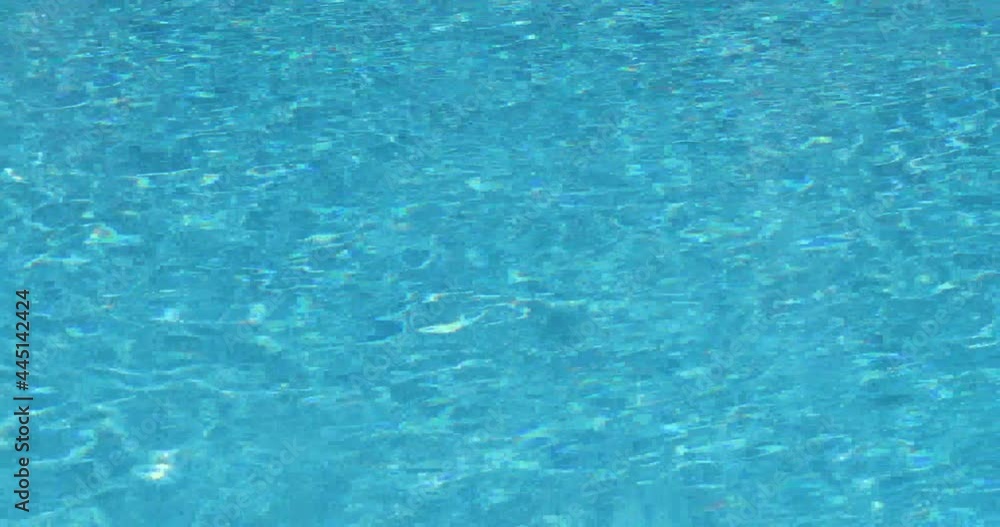 crystal clear blue water in the pool, blue natural background crystal clear blue water in the pool, blue natural background