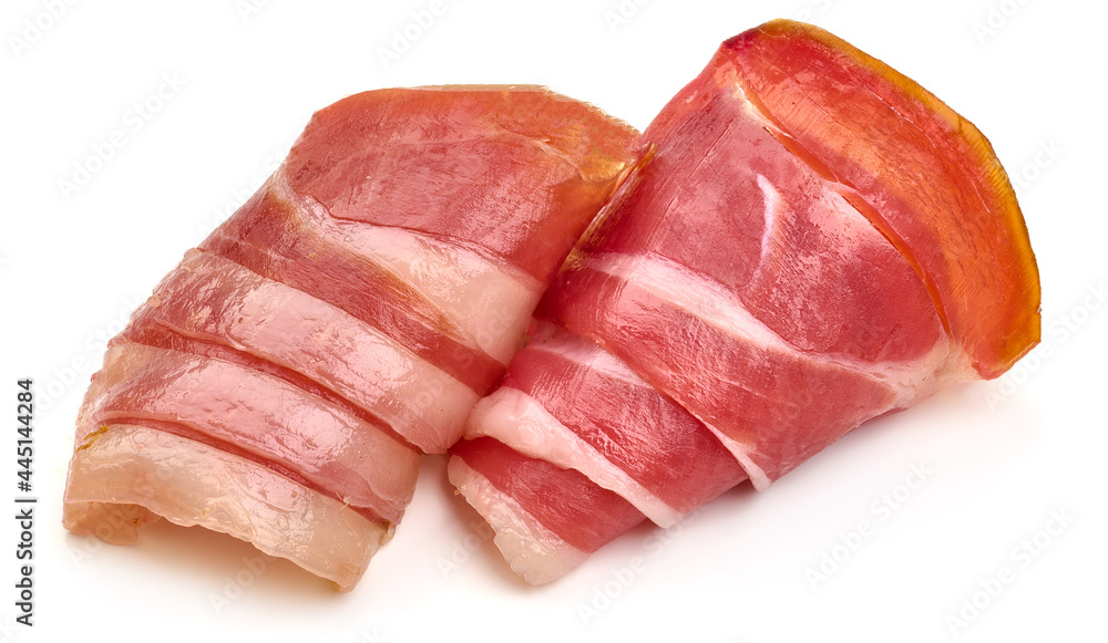 Italian prosciutto crudo or jamon, isolated on white background. High resolution image. Italian prosciutto crudo or jamon, isolated on white background. High resolution image.