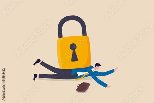 Business closing down or die in Coronavirus pandemic lockdown crisis, unemployment and debt problem or bankruptcy concept, depressed dying businessman entrepreneur under heavy lock pad burden.